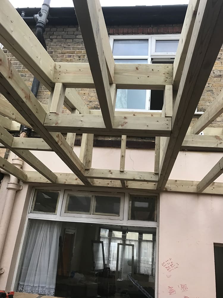 Steel beams and joists seen from below during structural work