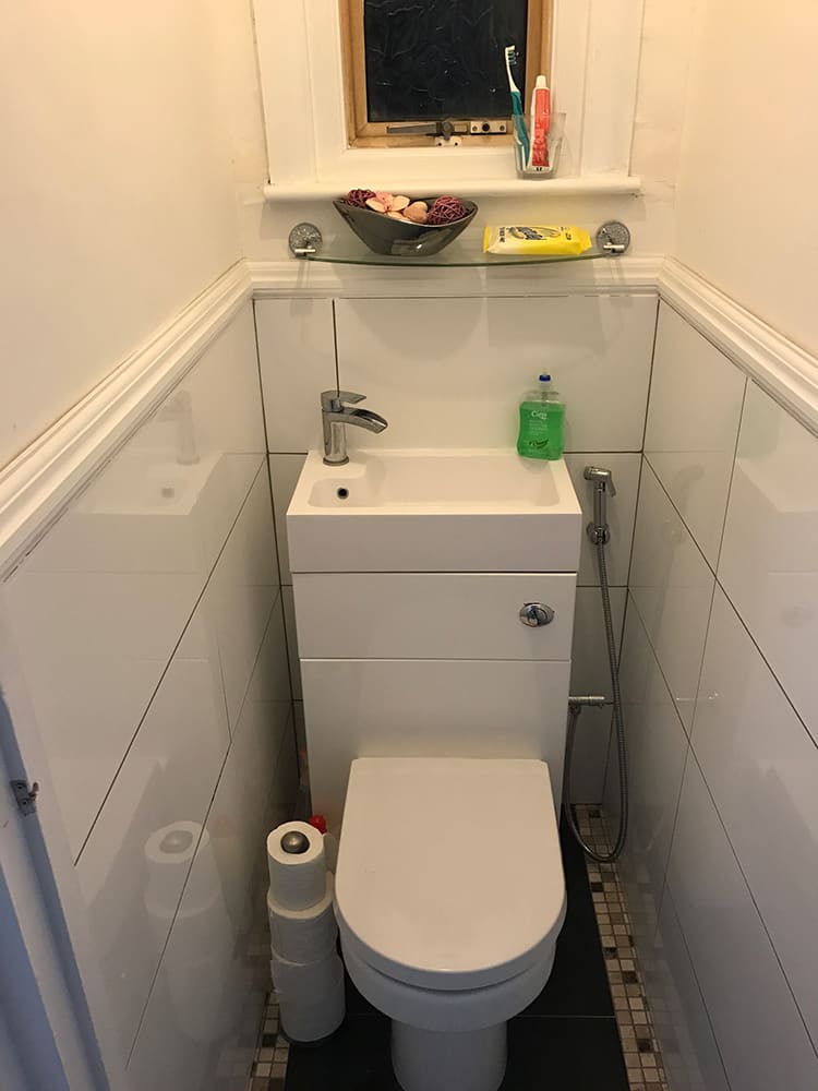 Compact cloakroom with basin unit over the WC