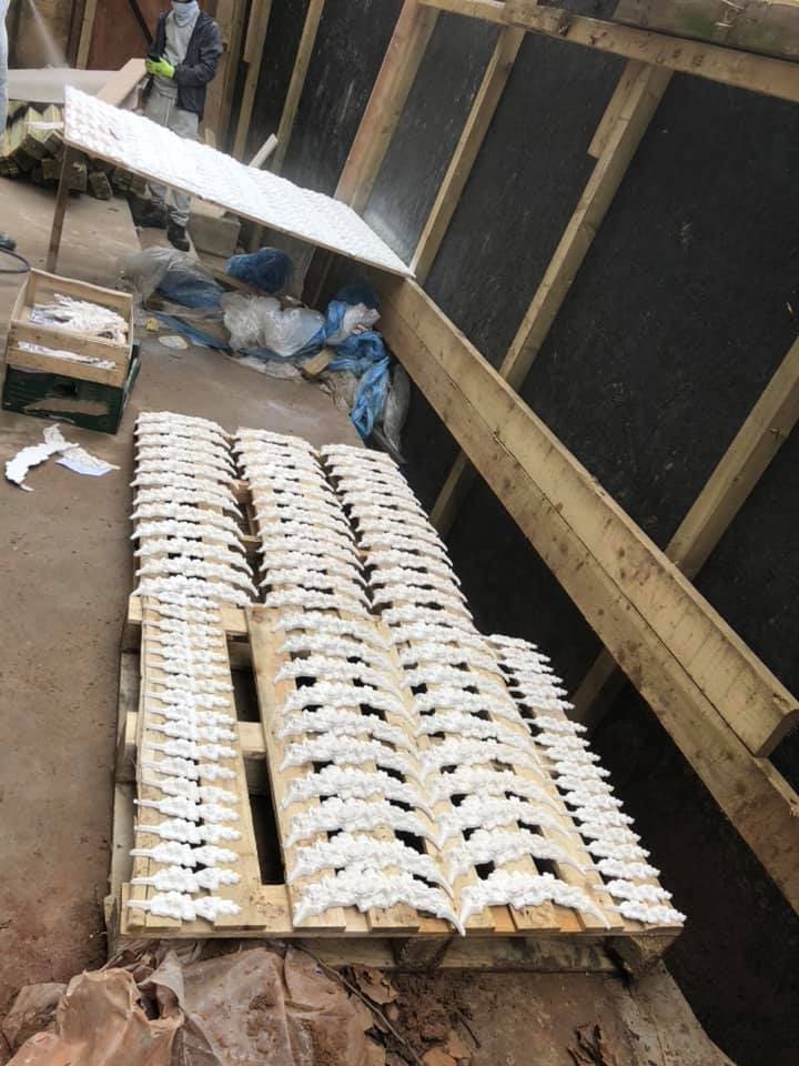 Decorative plaster mouldings stacked before installation