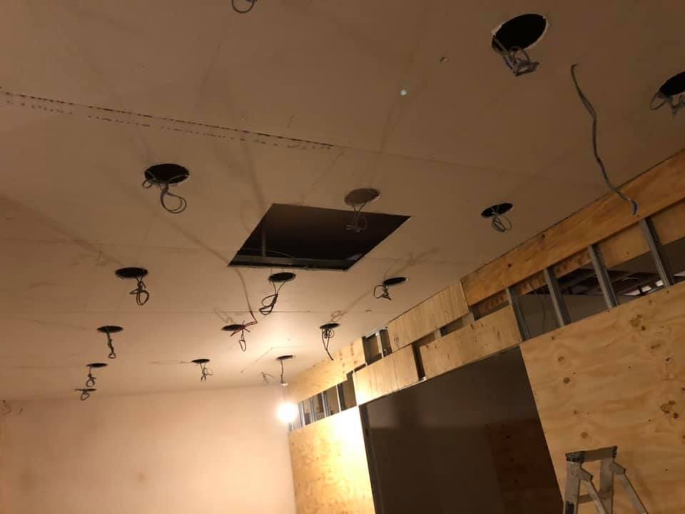 Ceiling opening showing services during fit-out