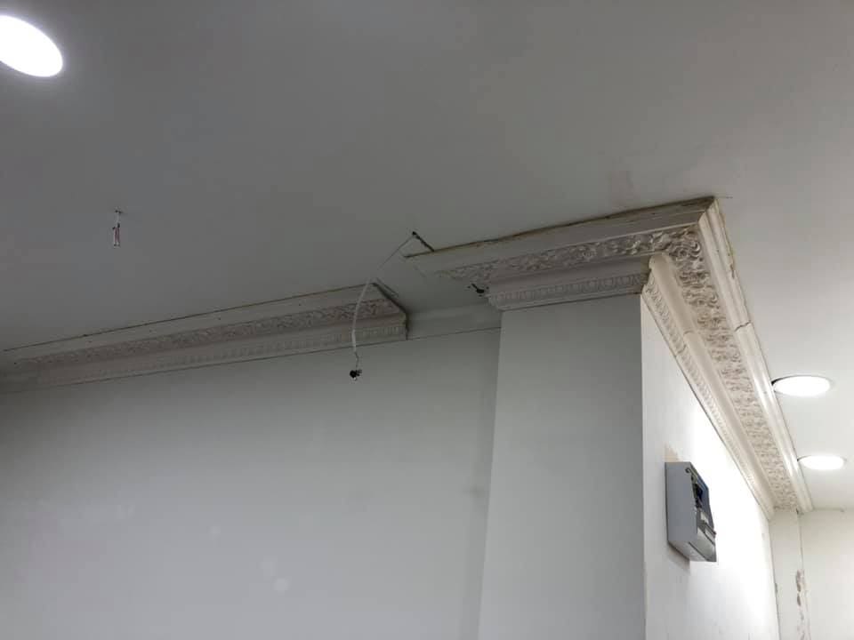 Decorative cornice corner detail, painted and finished
