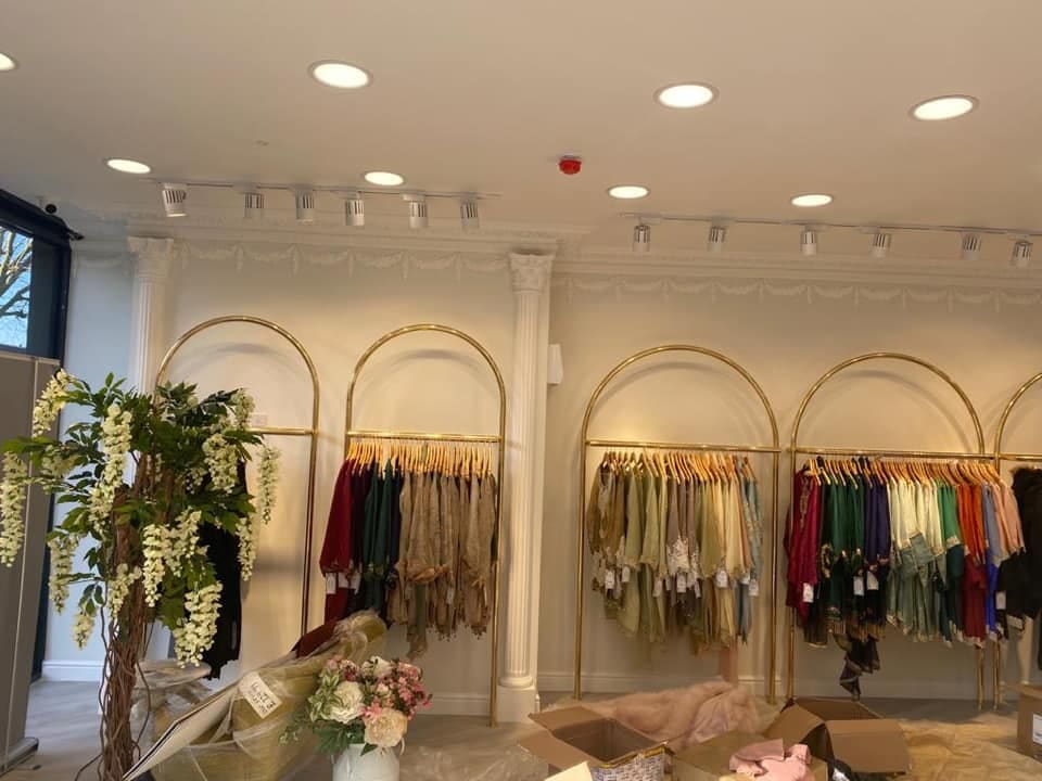 Completed boutique interior with dressed display walls