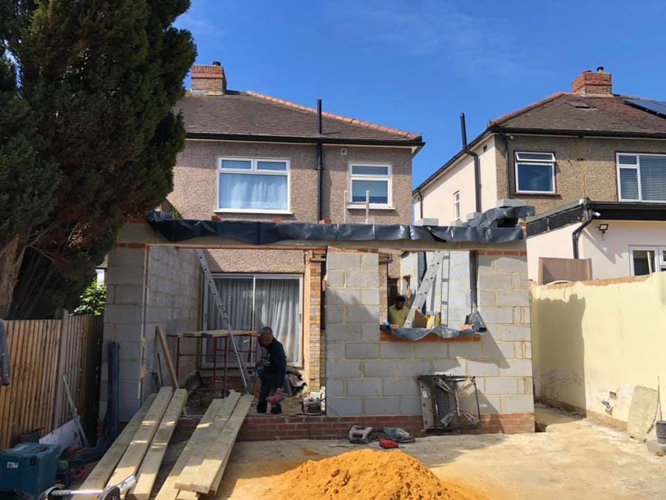 Rear garden of a 1930s semi-detached house before extension works begin