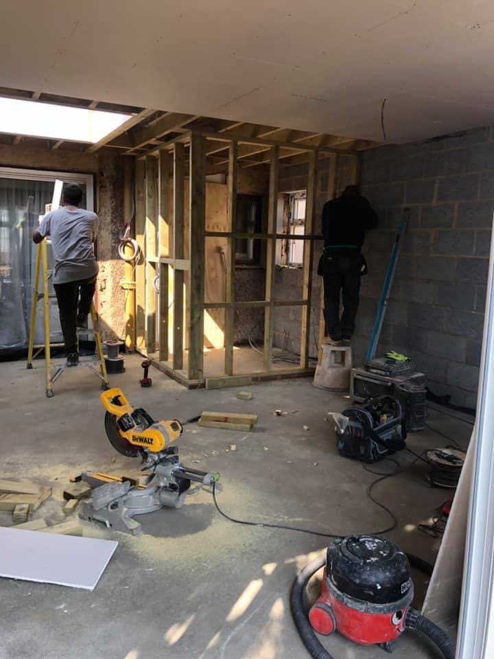 Stud partition and chop saw during first fix inside the extension
