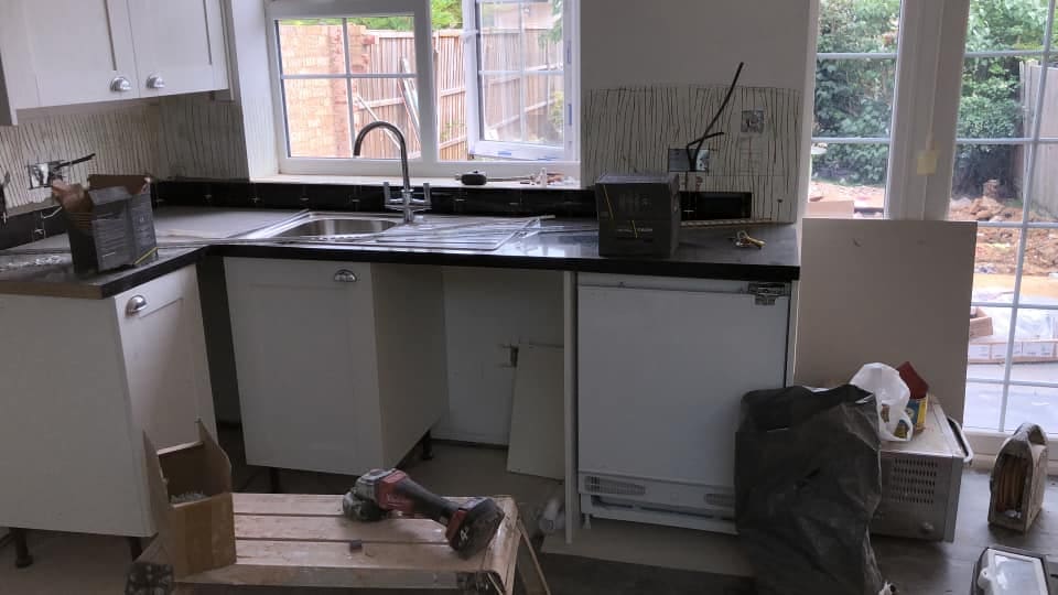 Kitchen sink run and units during second fix