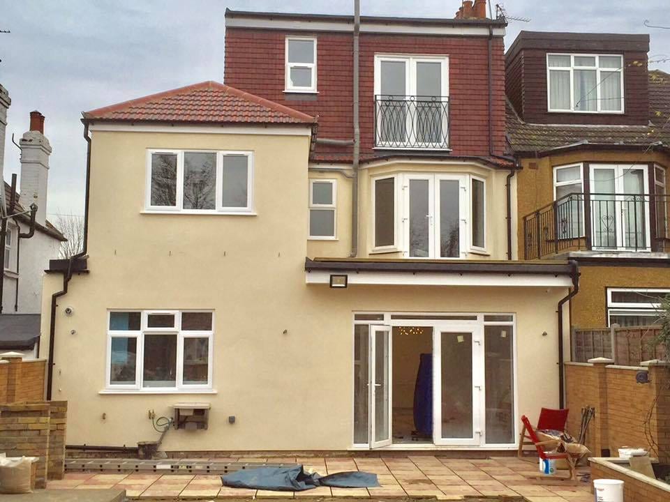 Rendered multi-storey rear elevation of a new build under construction